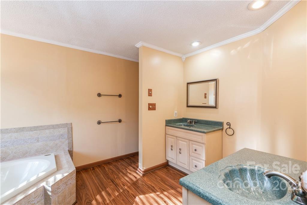 26050 Neptunes Landing Tega Cay, SC 29708 - Photo 24 of 39 a hallway with washer and dryer