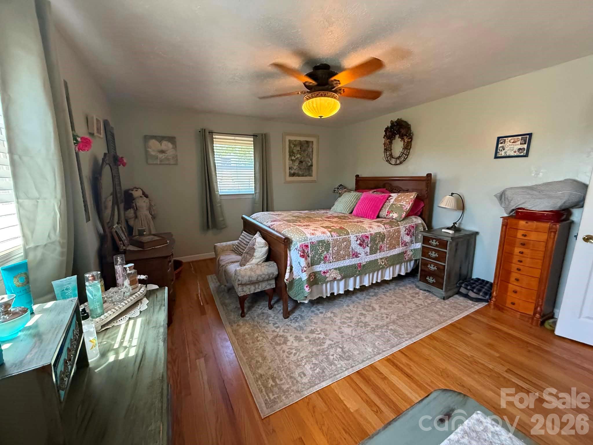 2121 Union Grove Road Lenoir, NC 28645 - Photo 19 of 38 a bedroom with bed and wooden floor