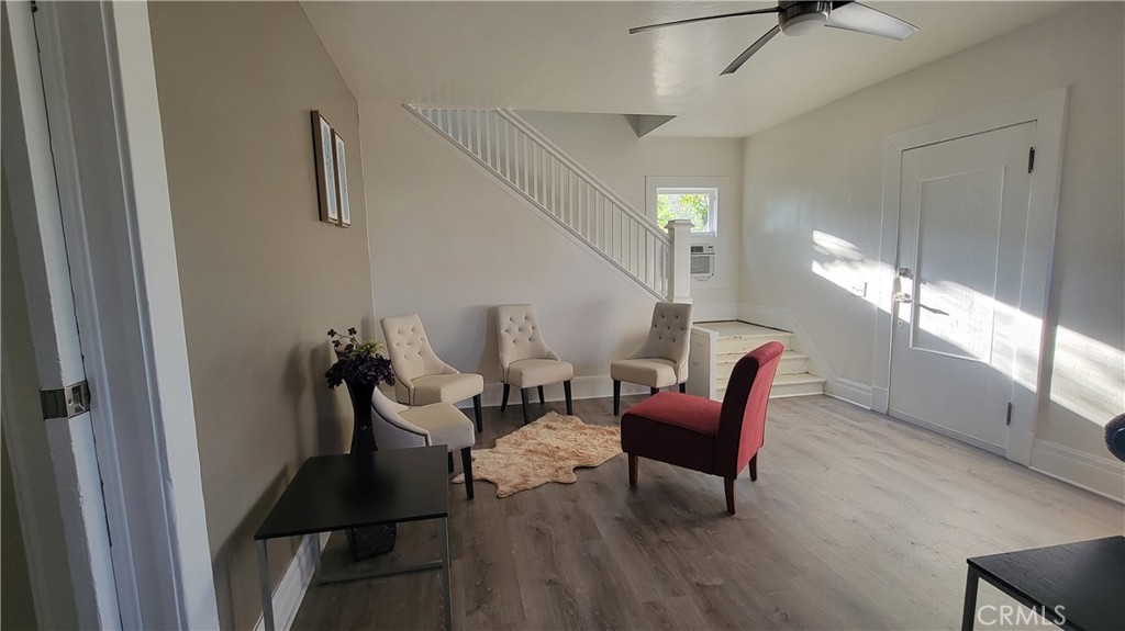 503 West Colton Avenue Redlands, CA 92374 - Photo 6 of 18 a living room with furniture and a chair