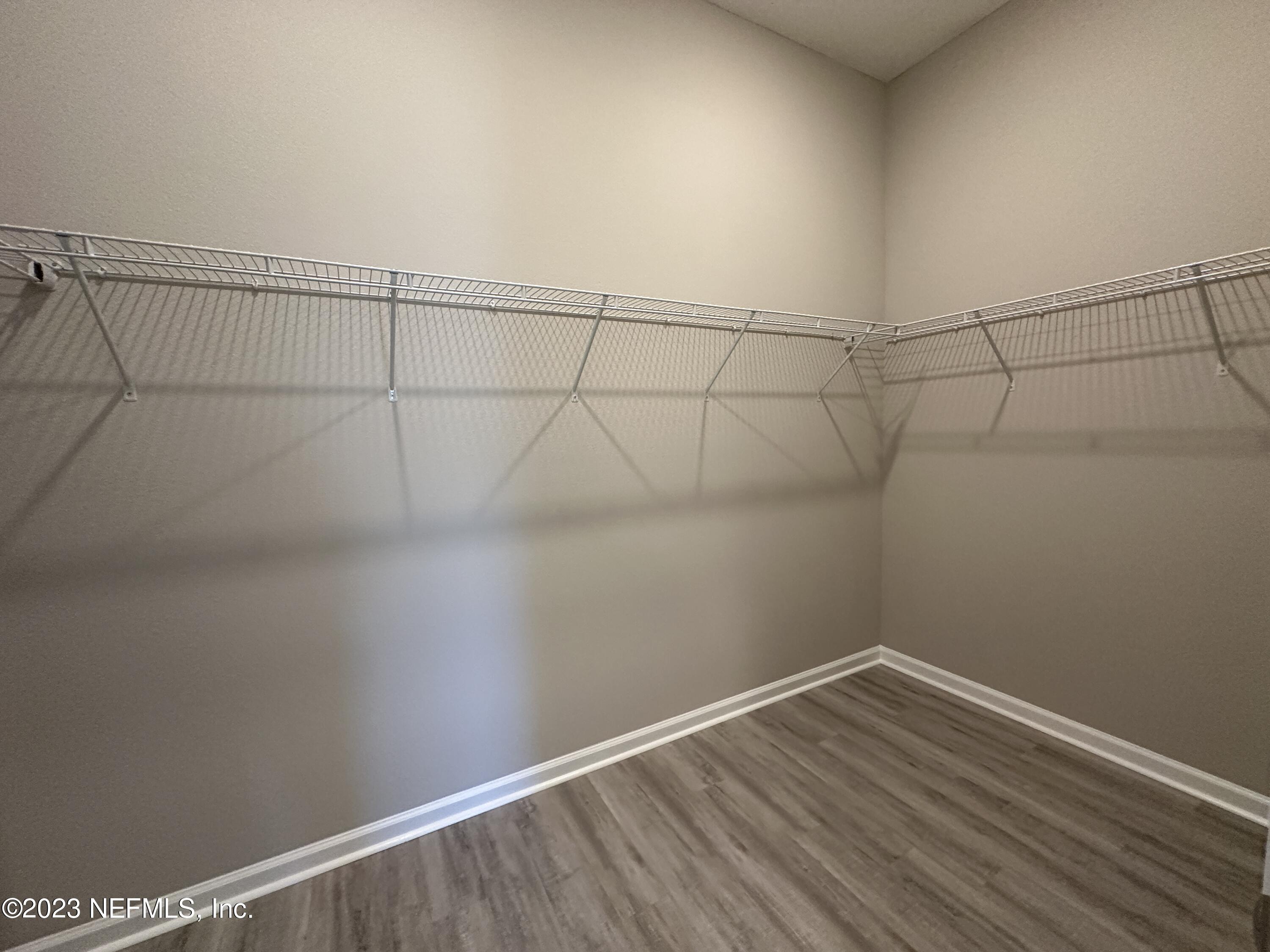 9 Jackson Blue Place Palm Coast, FL 32137 - Photo 11 of 21 a view of a room with racks on the wall