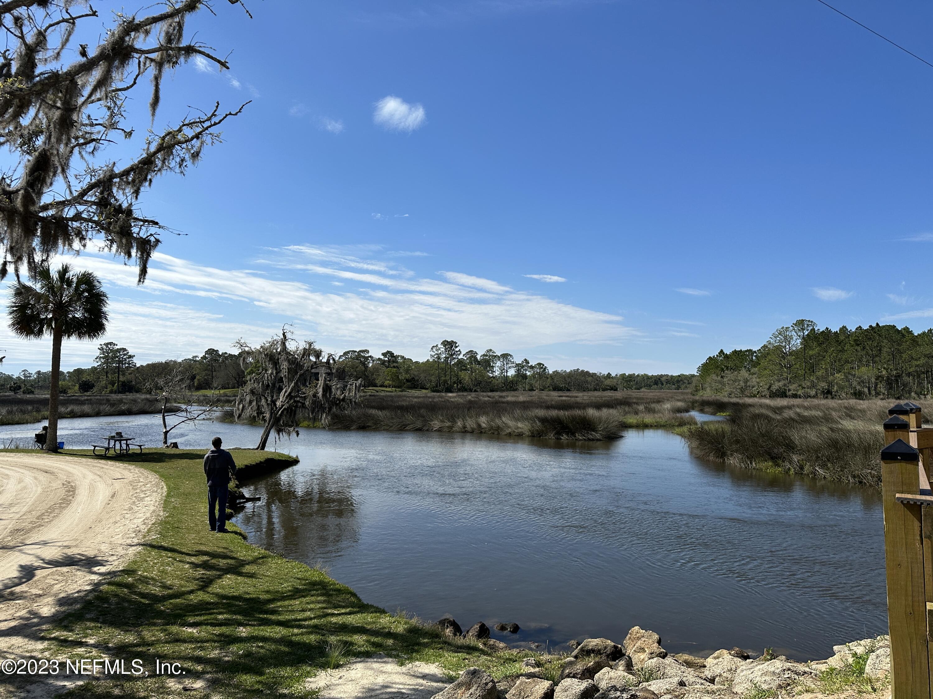 9 Jackson Blue Place Palm Coast, FL 32137 - Photo 20 of 21 a view of a lake with houses