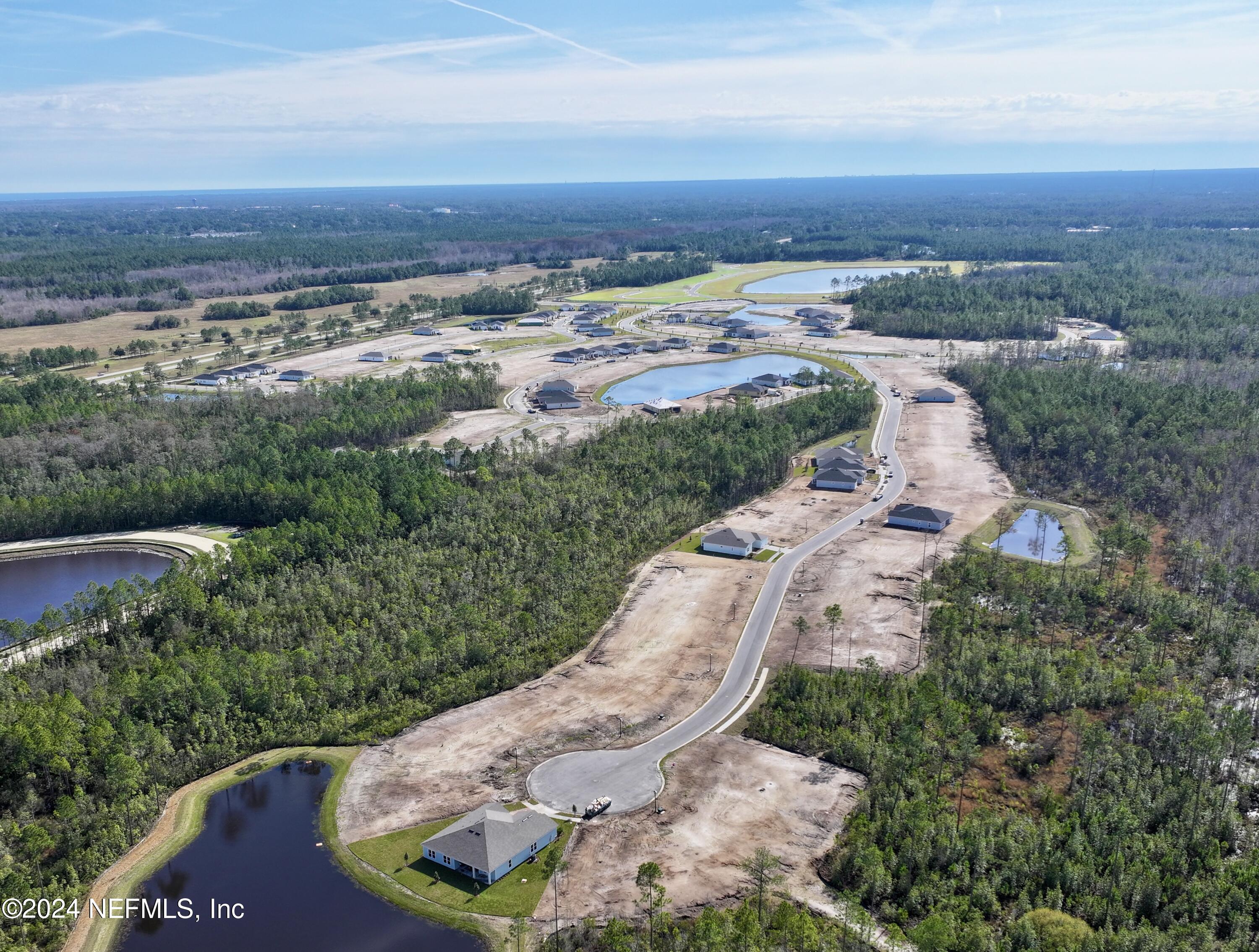 9 Jackson Blue Place Palm Coast, FL 32137 - Photo 21 of 21 an aerial view of multiple house