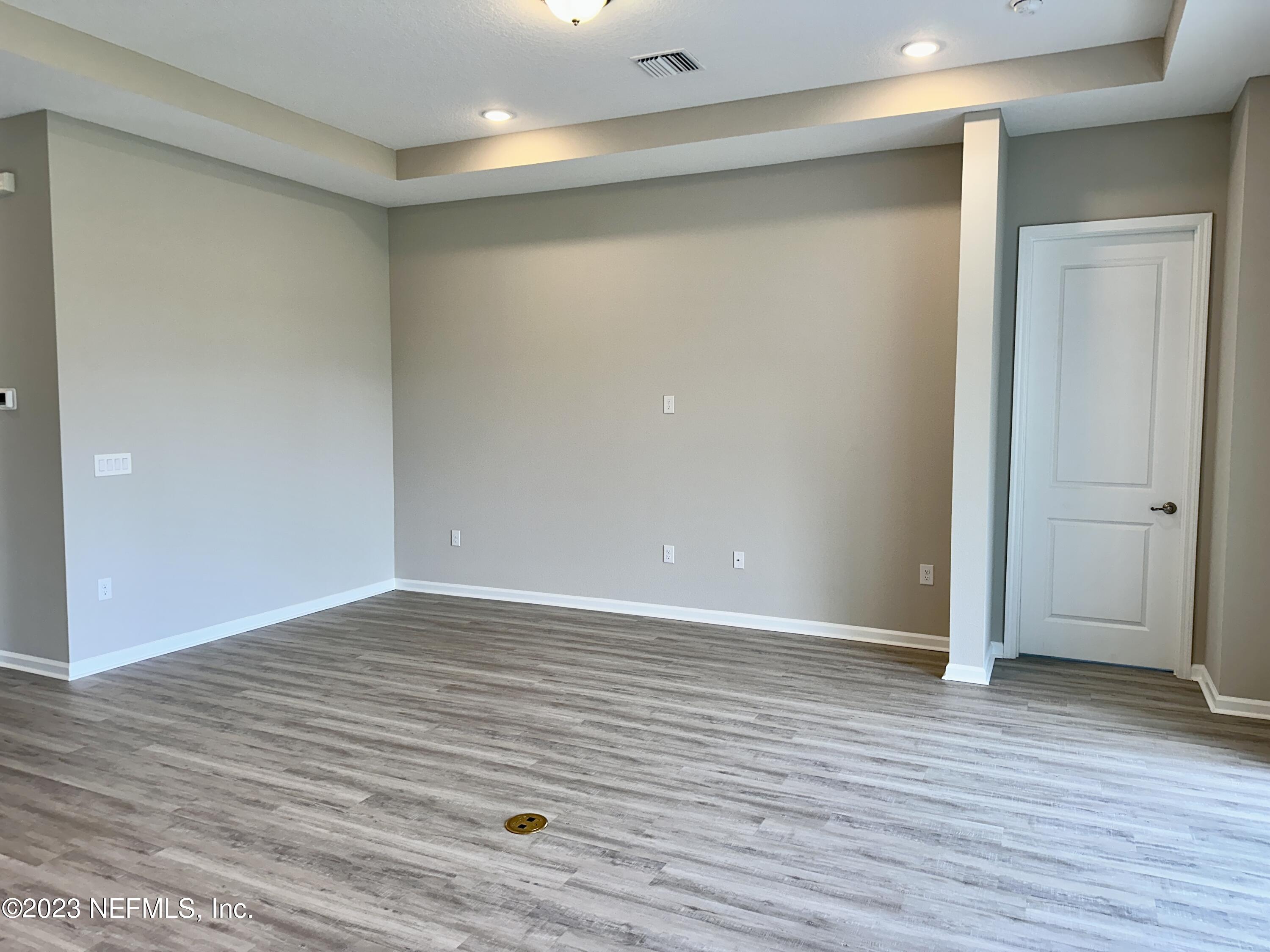 9 Jackson Blue Place Palm Coast, FL 32137 - Photo 6 of 21 wooden floor in an empty room