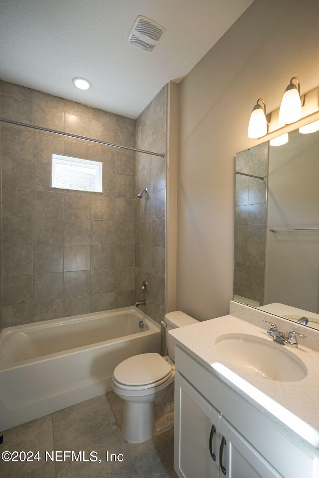 9 Jackson Blue Place Palm Coast, FL 32137 - Photo 9 of 21 a bathroom with a sink a toilet and shower