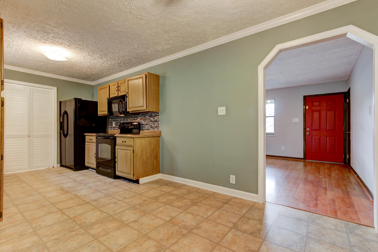 1437 Dutch Valley Road Clinton, TN 37716 - Photo 5 of 19 a kitchen with stainless steel appliances granite countertop a refrigerator and a sink