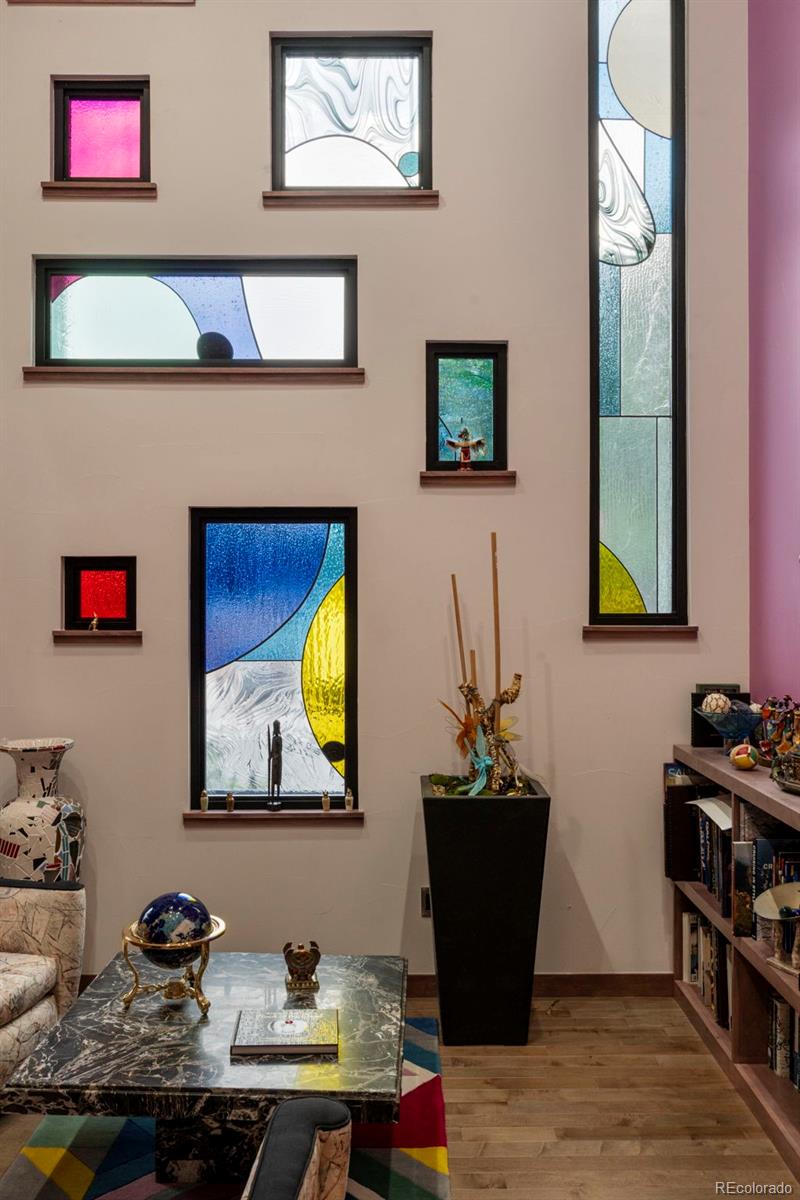4541 Reed Street Wheat Ridge, CO 80033 - Photo 19 of 43 a room with furniture and wooden floor