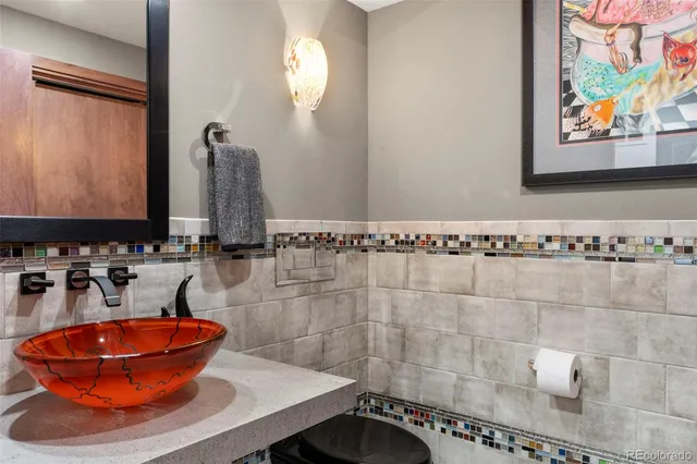 a bedroom with two beds and a couch