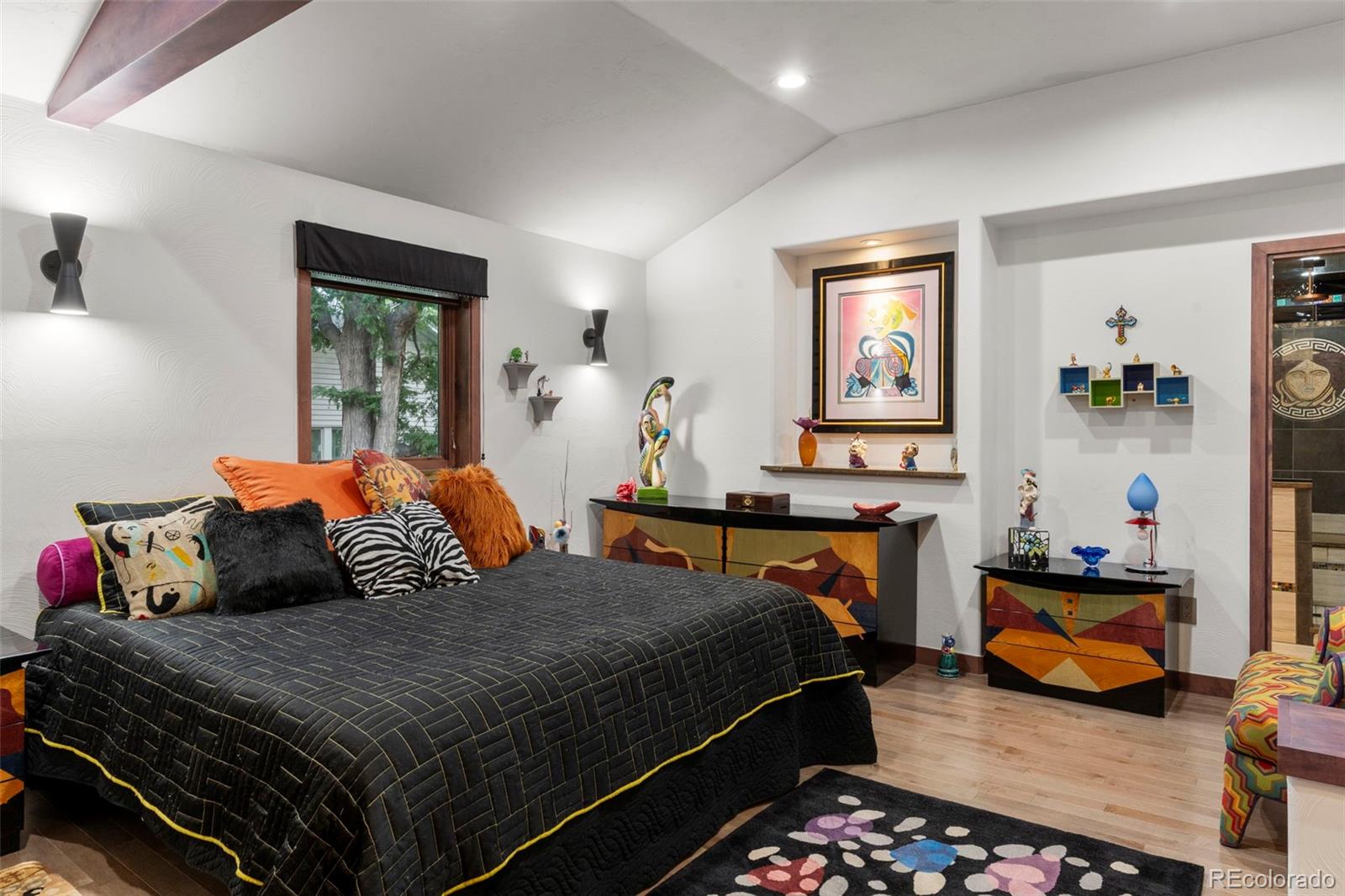 4541 Reed Street Wheat Ridge, CO 80033 - Photo 23 of 43 a bedroom with two beds and a couch