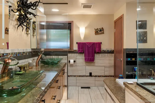 a view of a kitchen with a sink and dishwasher