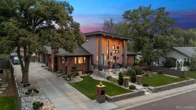 a front view of a house with yard