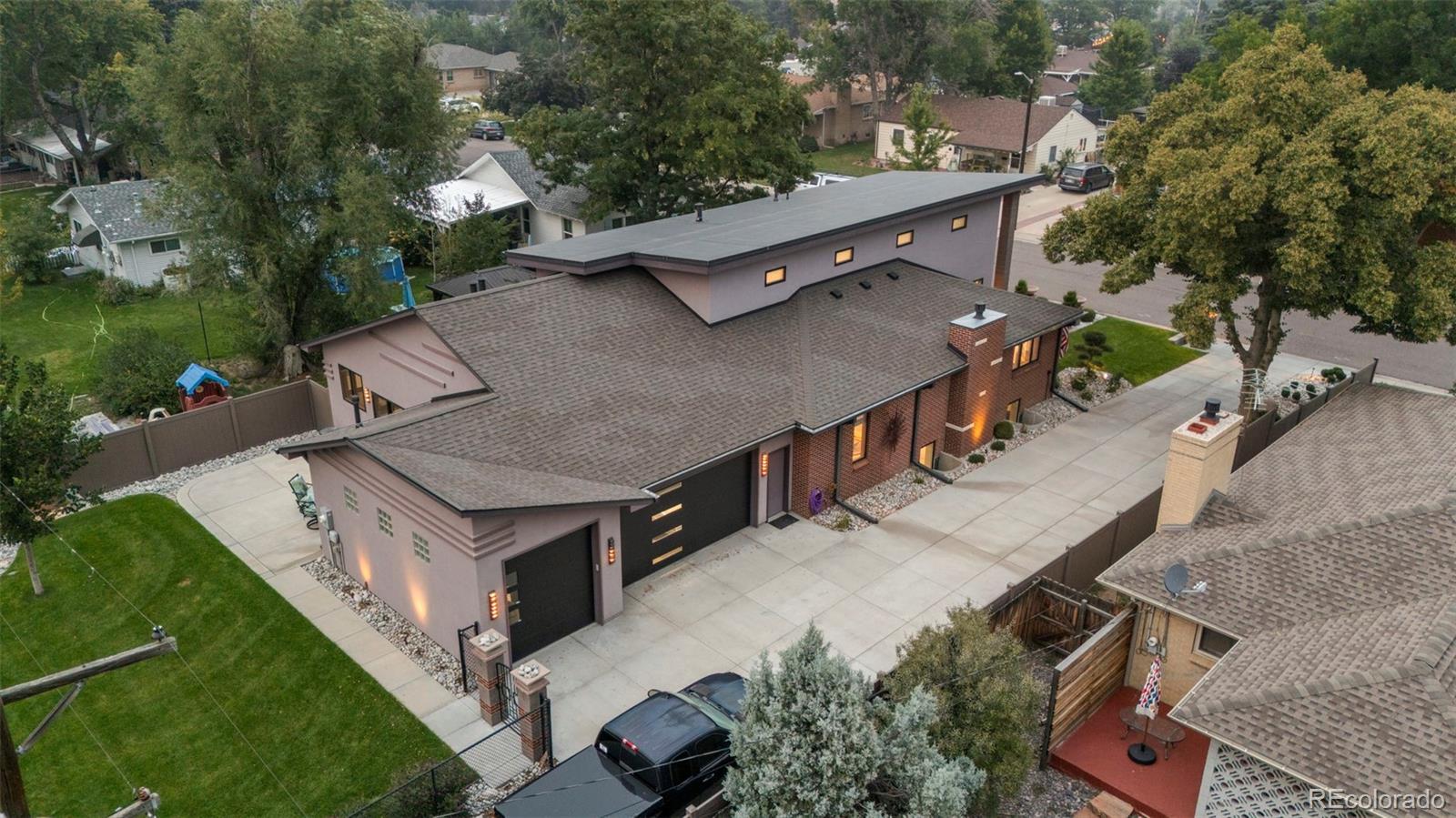 4541 Reed Street Wheat Ridge, CO 80033 - Photo 41 of 43 an aerial view of a house with a yard