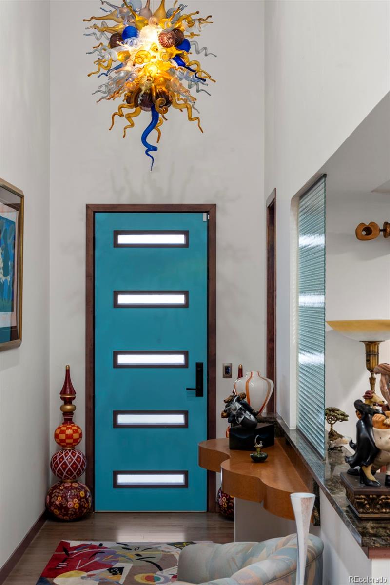 4541 Reed Street Wheat Ridge, CO 80033 - Photo 7 of 43 a room with furniture and a potted plant