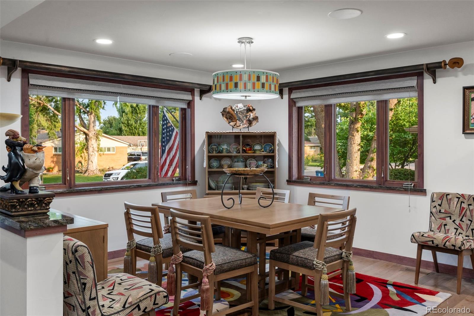 4541 Reed Street Wheat Ridge, CO 80033 - Photo 8 of 43 a view of a dining room with furniture window and outside view