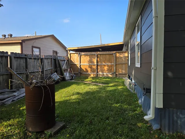 a view of street with parked cars