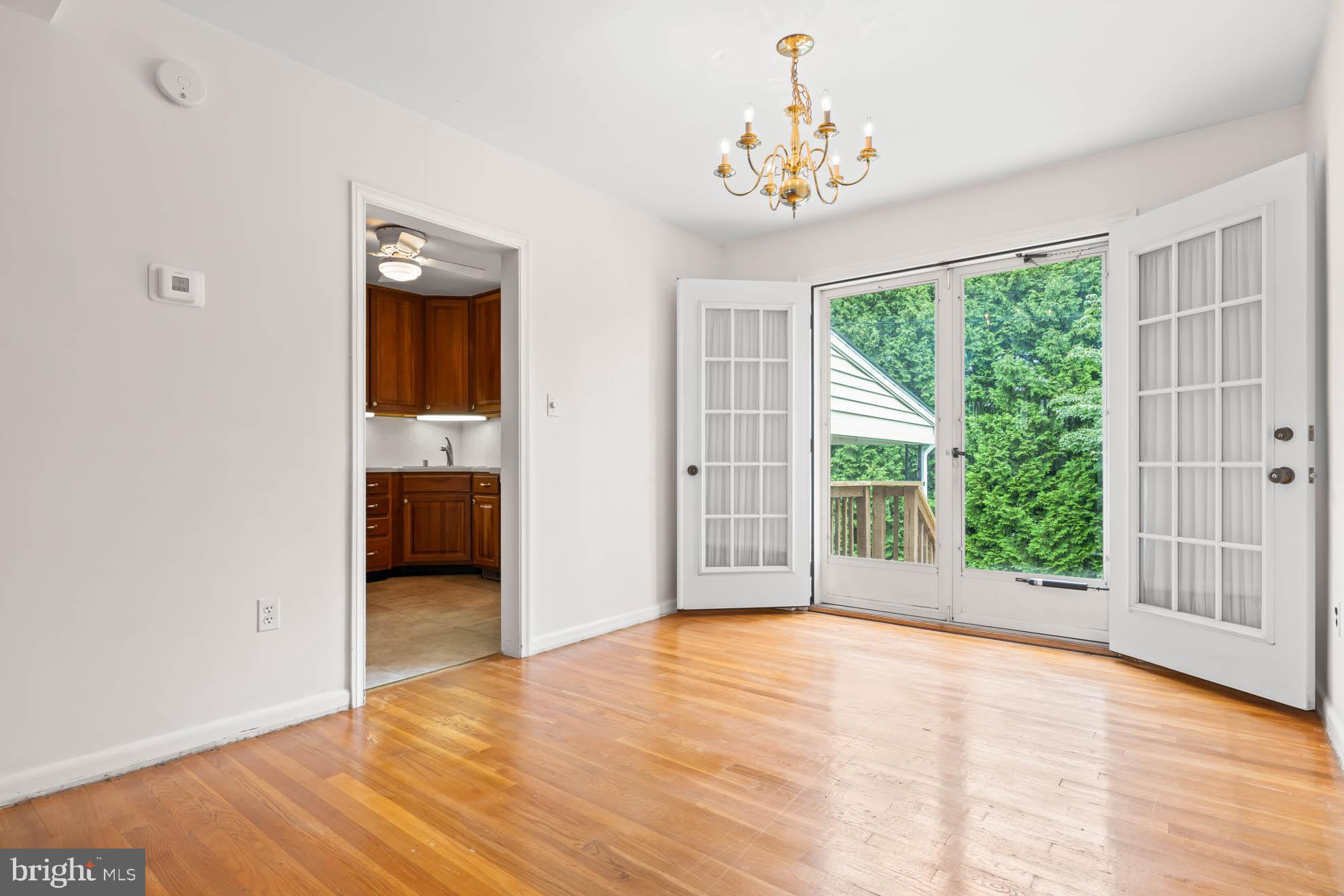 210 Rothwell Drive Lutherville-Timonium, MD 21093 - Photo 12 of 48 a view of a room with wooden floor and a window