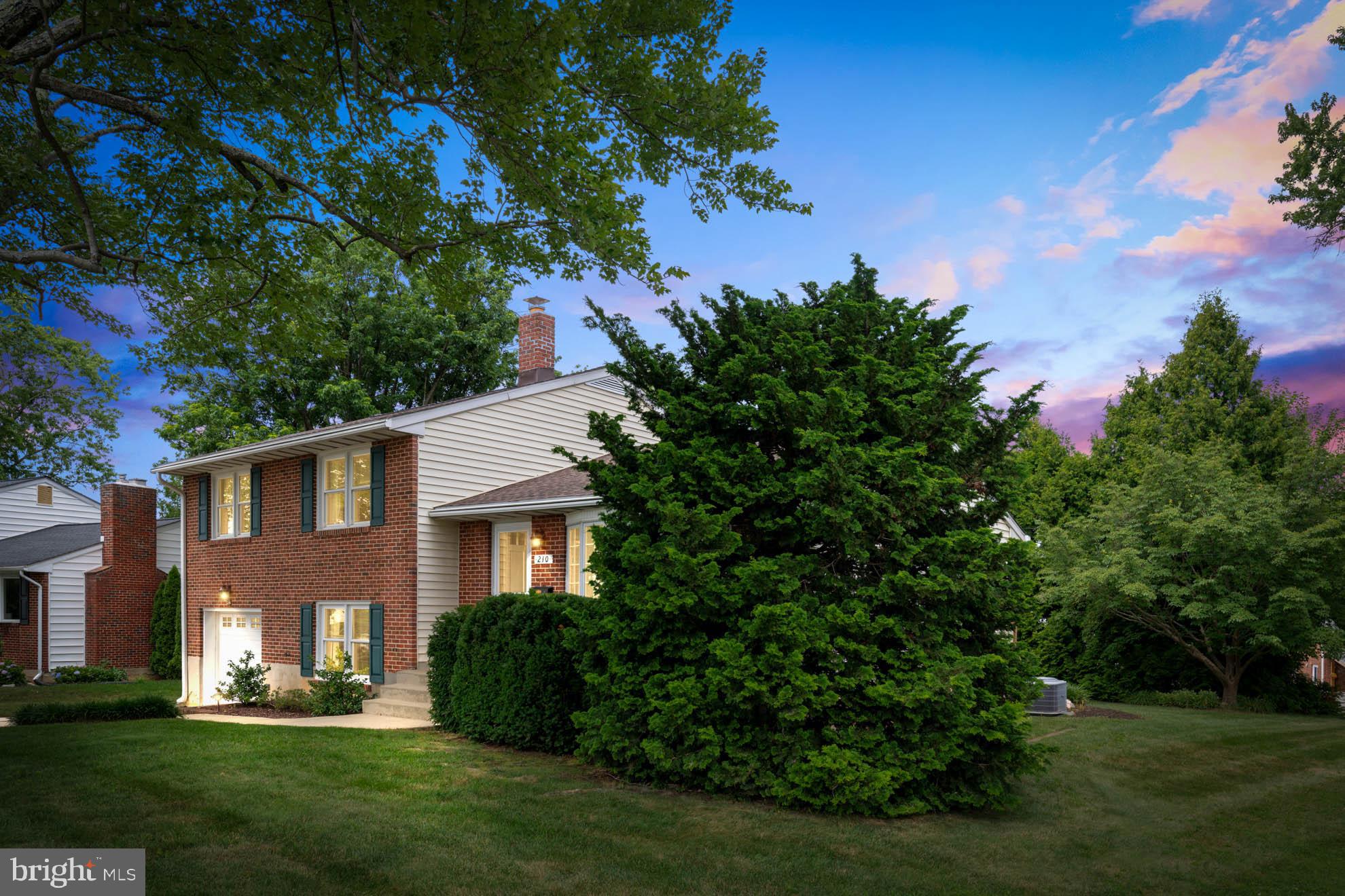 210 Rothwell Drive Lutherville-Timonium, MD 21093 - Photo 2 of 48 a front view of a house with a yard
