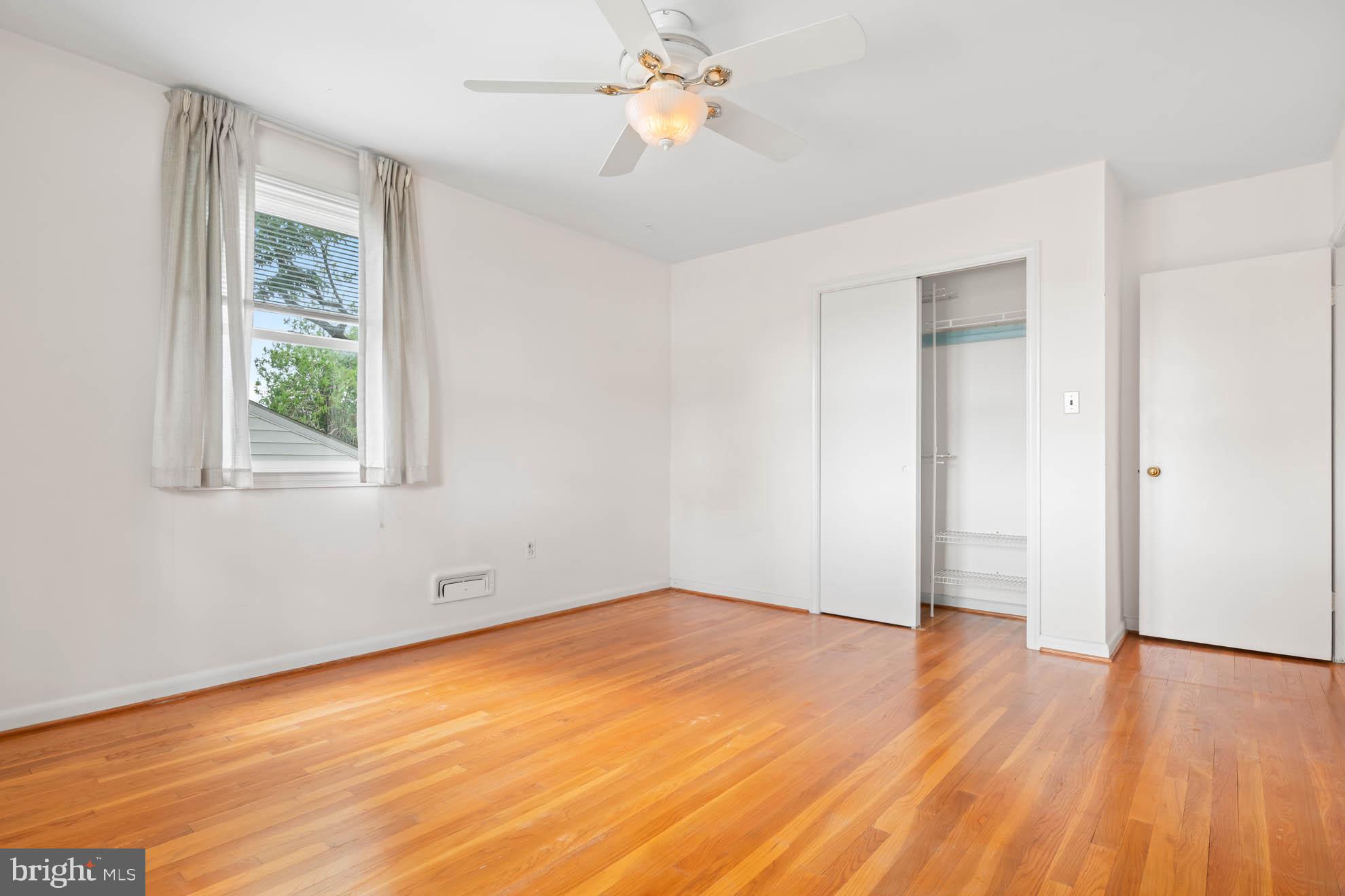 210 Rothwell Drive Lutherville-Timonium, MD 21093 - Photo 24 of 48 a view of empty room with wooden floor and fan