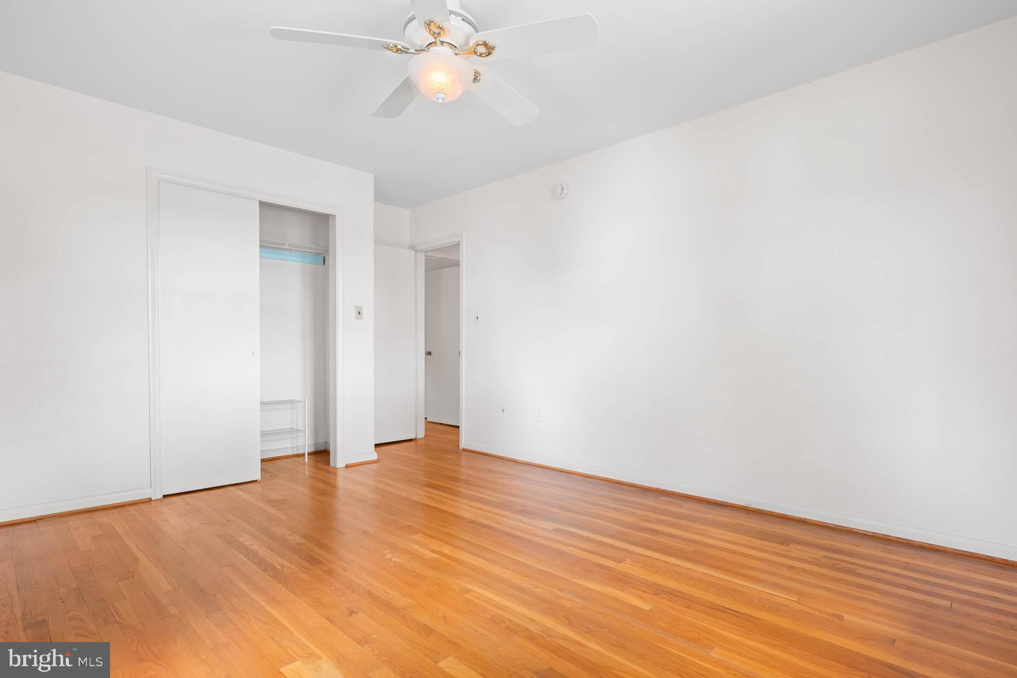 210 Rothwell Drive Lutherville-Timonium, MD 21093 - Photo 25 of 48 a view of an empty room with wooden floor