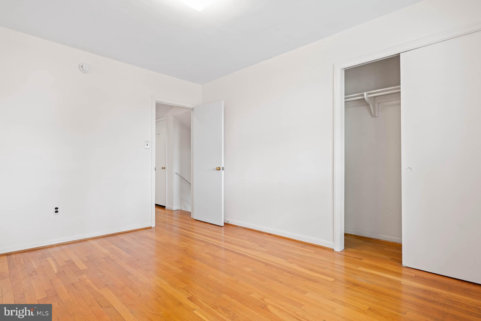 210 Rothwell Drive Lutherville-Timonium, MD 21093 - Photo 29 of 48 a view of an empty room with wooden floor