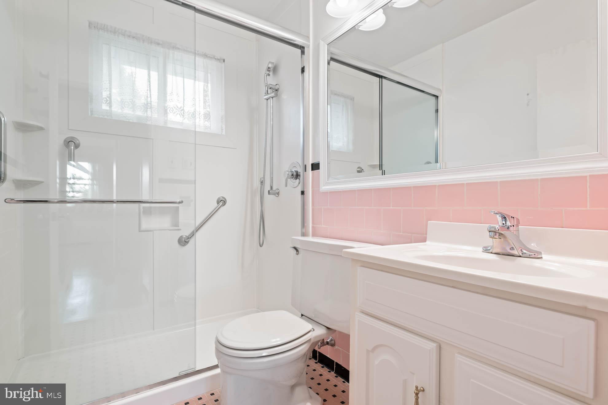 210 Rothwell Drive Lutherville-Timonium, MD 21093 - Photo 31 of 48 a bathroom with a sink a toilet and shower
