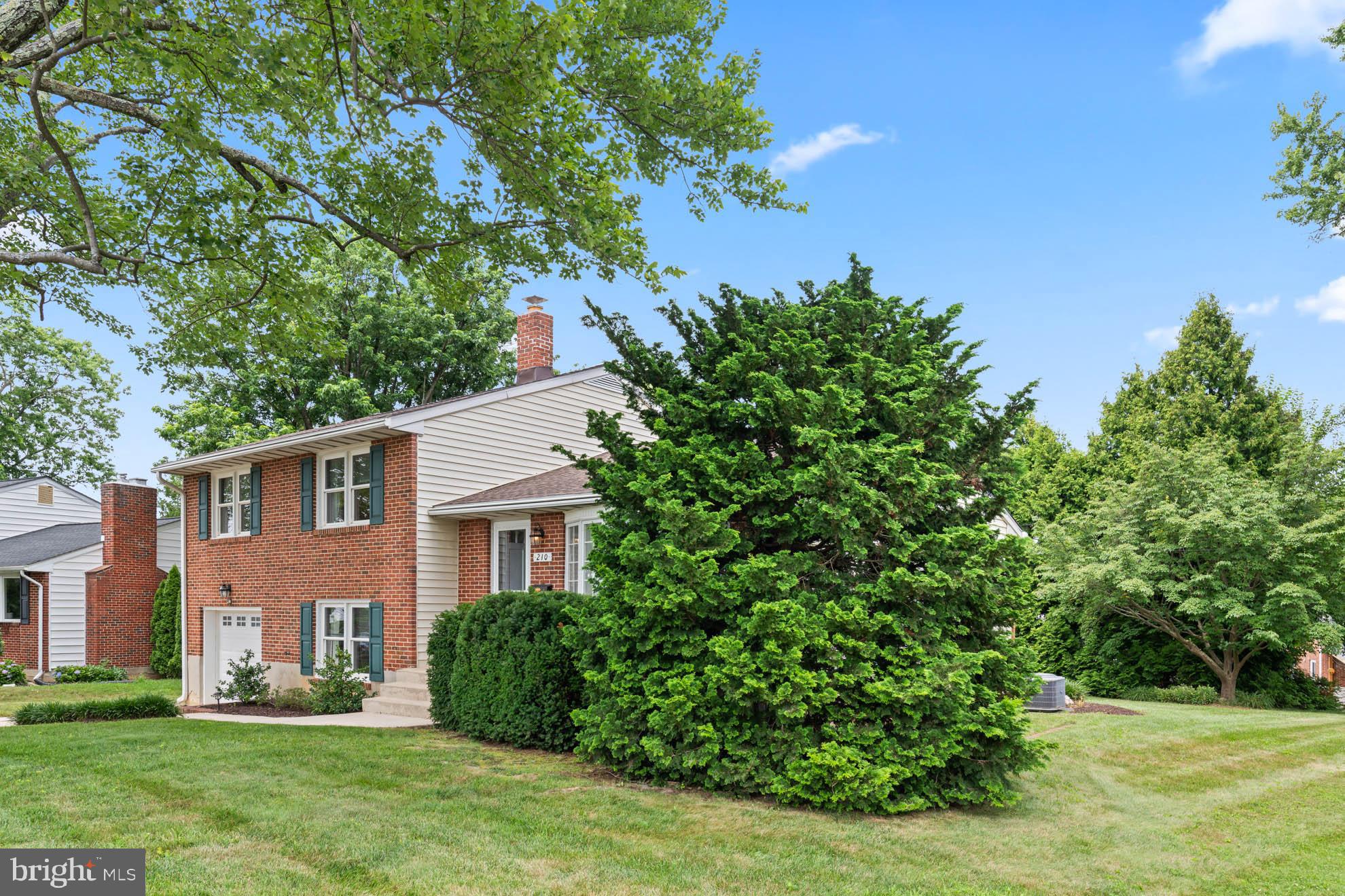 210 Rothwell Drive Lutherville-Timonium, MD 21093 - Photo 45 of 48 a front view of a house with a yard