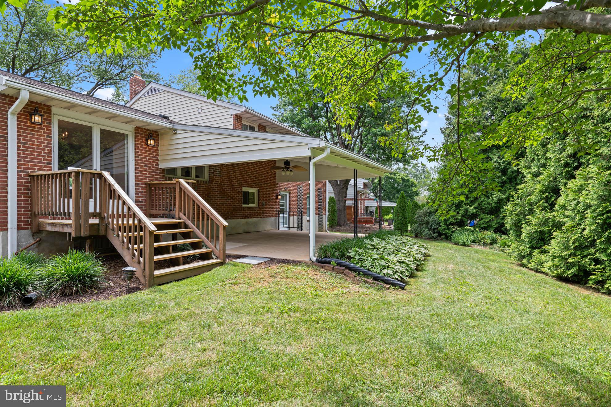 210 Rothwell Drive Lutherville-Timonium, MD 21093 - Photo 46 of 48 a front view of a house with garden