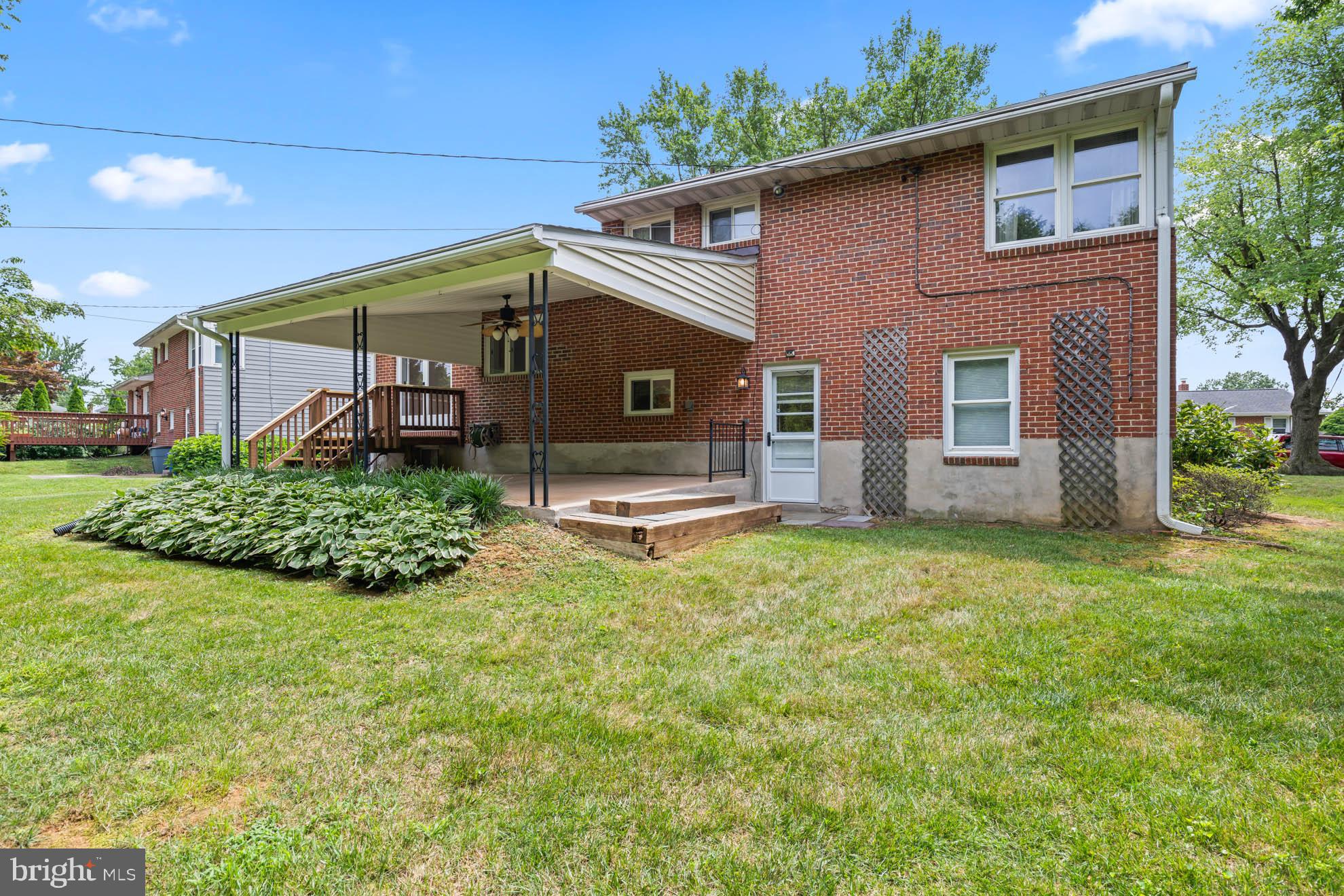 210 Rothwell Drive Lutherville-Timonium, MD 21093 - Photo 6 of 48 a front view of house with yard