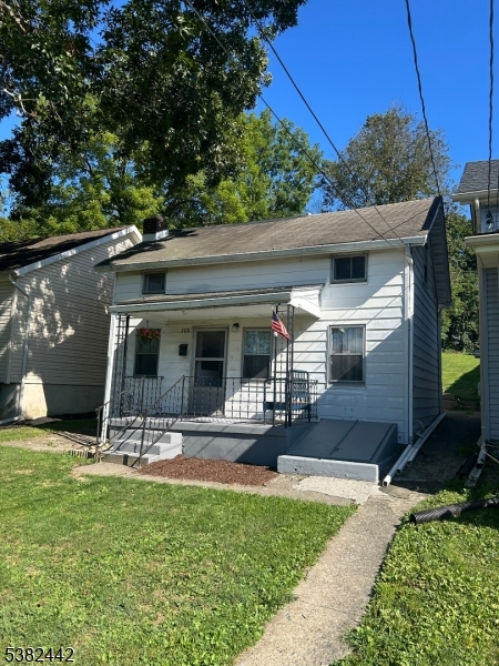 100 Myrtle Avenue Washington, NJ 07882 - Photo 2 of 37 a view of a patio with table and chairs a barbeque with potted plants