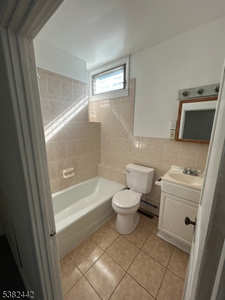 100 Myrtle Avenue Washington, NJ 07882 - Photo 28 of 37 a bathroom with a sink a toilet and shower