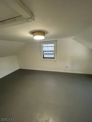 a view of a room with a hallway