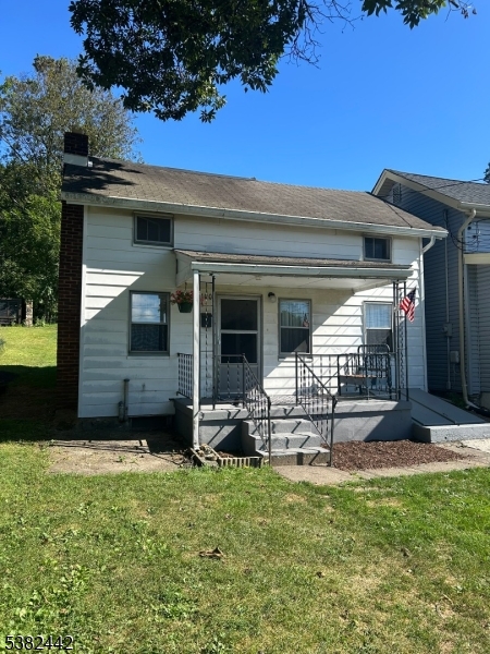 100 Myrtle Avenue Washington, NJ 07882 - Photo 32 of 37 a view of a chair and table in backyard of the house