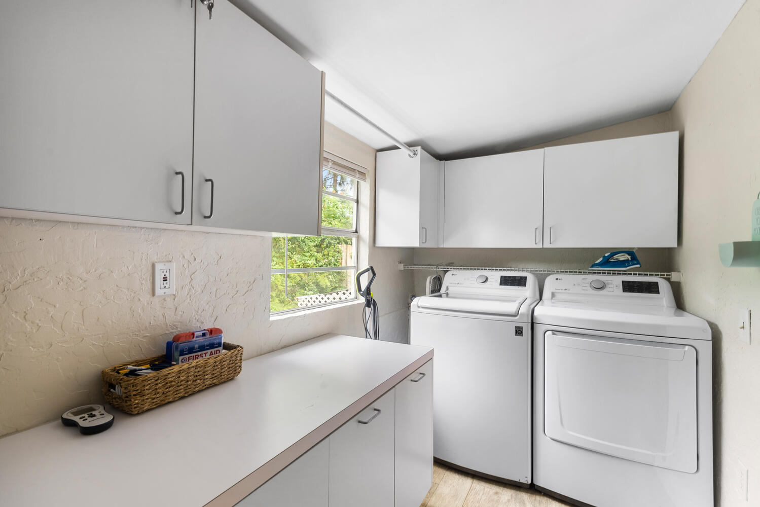 303 Lang Road Cloud Lake, FL 33406 - Photo 17 of 38 a utility room with dryer and washer