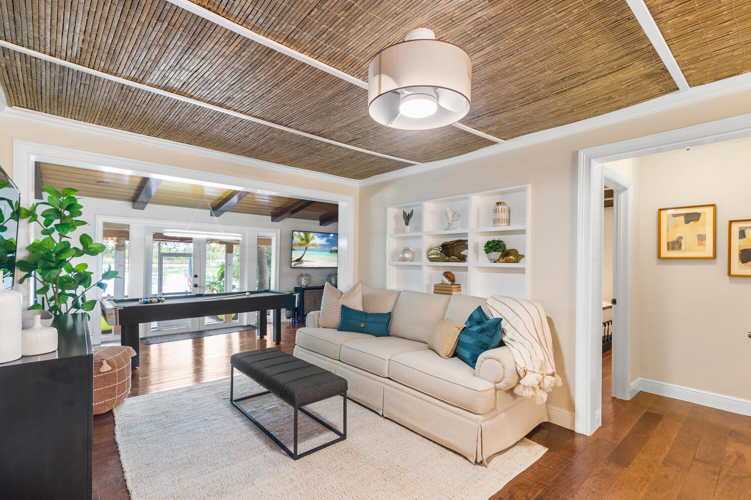 303 Lang Road Cloud Lake, FL 33406 - Photo 18 of 38 a living room with furniture and a large window