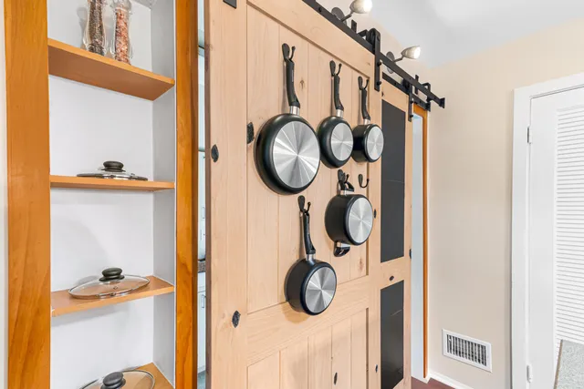 a bathroom with a mirror and shower curtain