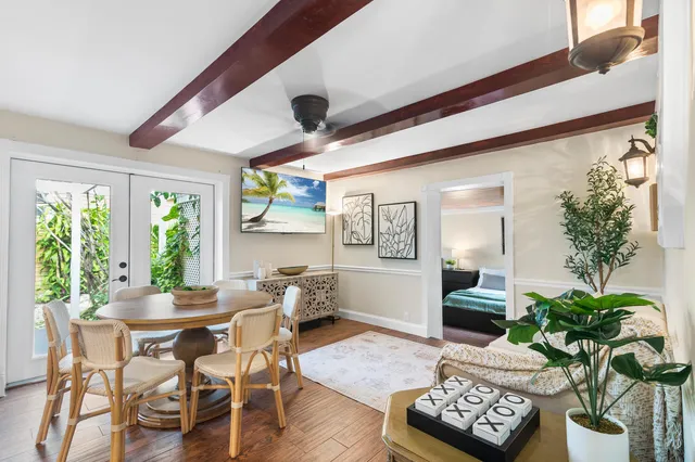 a living room with furniture and a table