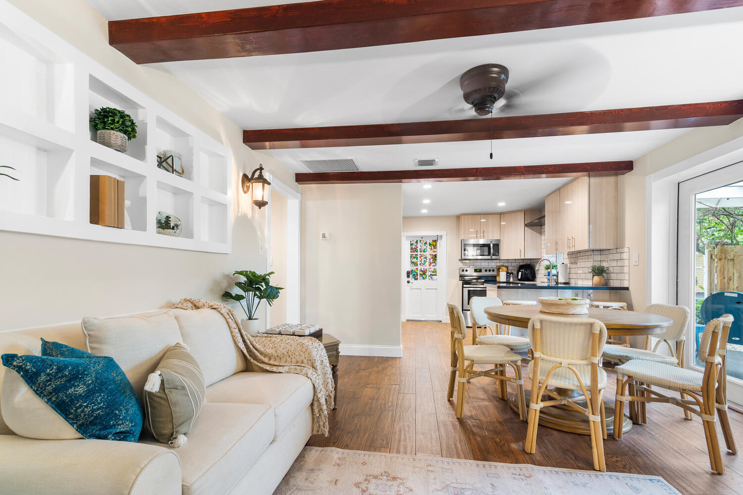 303 Lang Road Cloud Lake, FL 33406 - Photo 27 of 38 a living room with furniture and a table