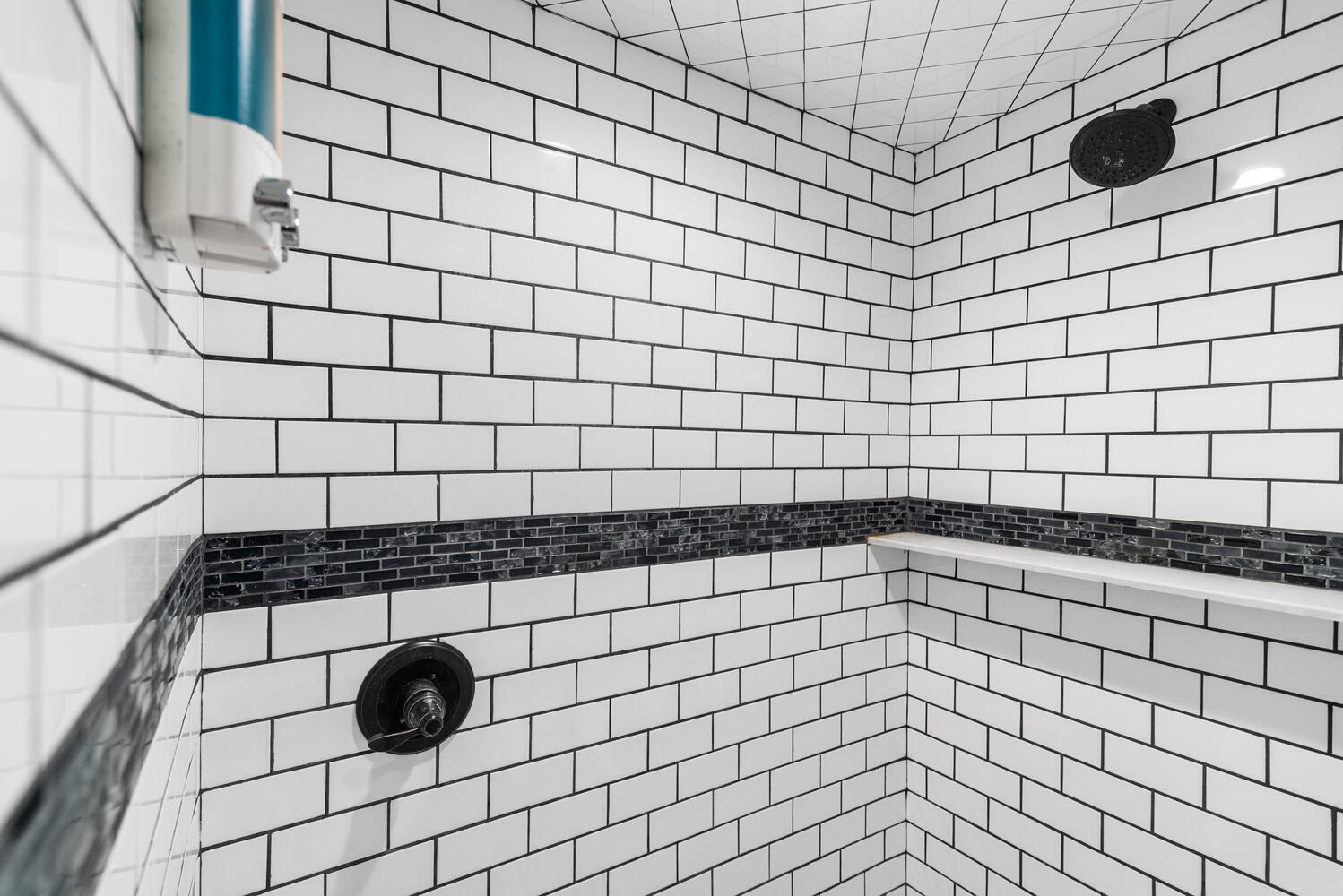 303 Lang Road Cloud Lake, FL 33406 - Photo 36 of 38 a bathroom with a shower