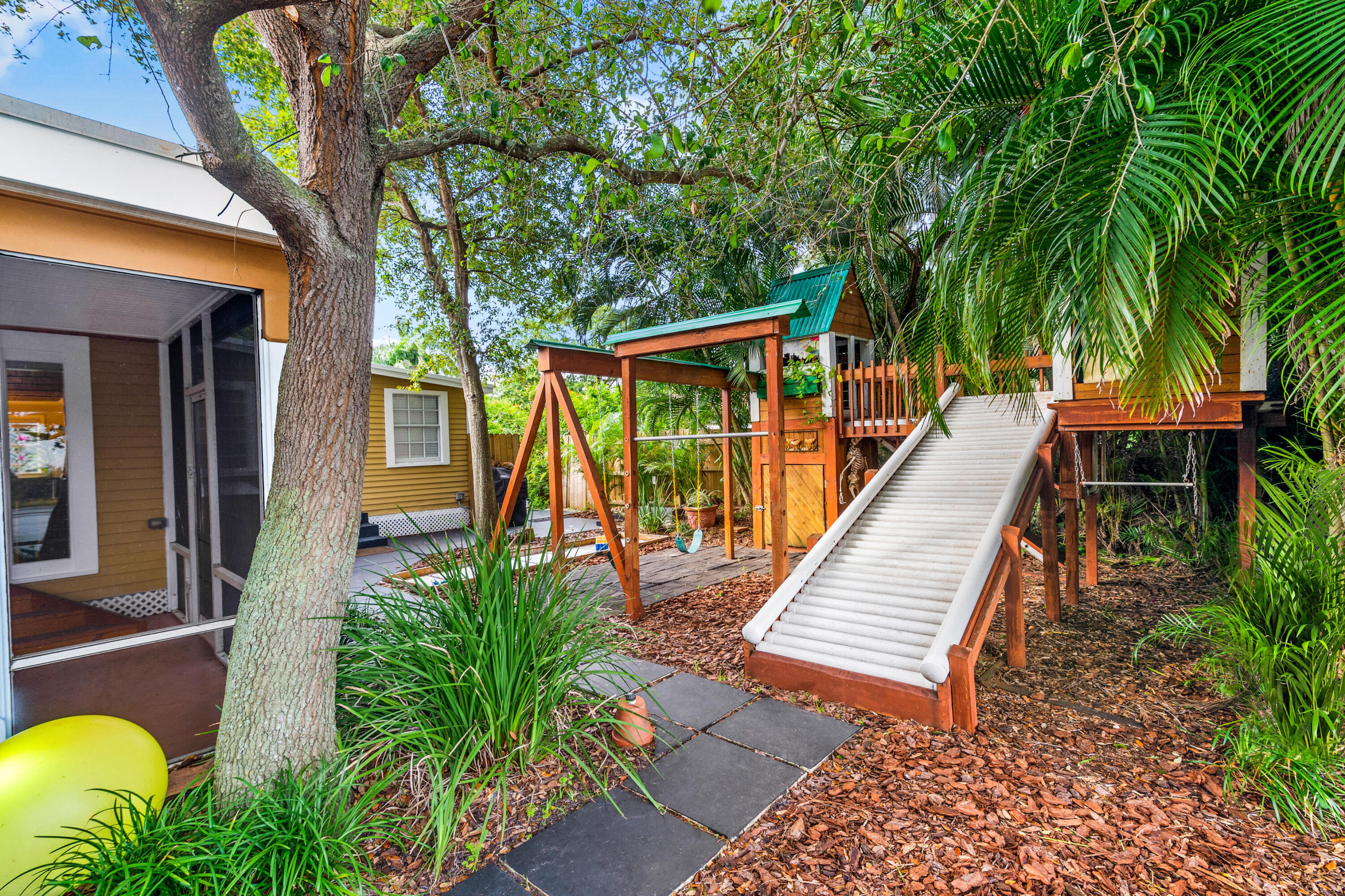 303 Lang Road Cloud Lake, FL 33406 - Photo 6 of 38 a view of outdoor space and deck