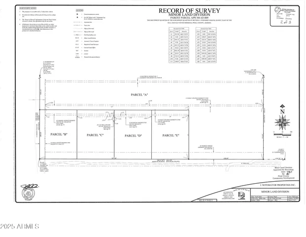 a kitchen with stainless steel appliances granite countertop a sink a refrigerator a stove a microwave and wooden floor