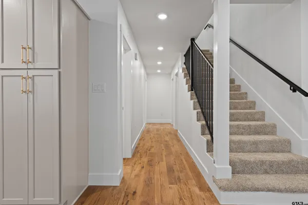 a view of a kitchen with wooden floor