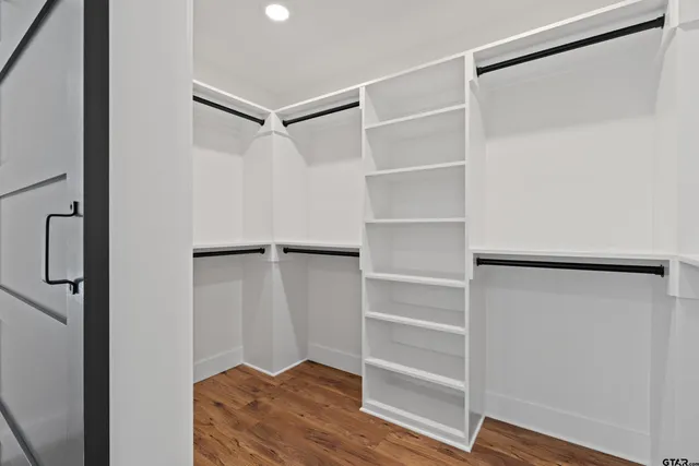 a bathroom with a double vanity sink mirror and double