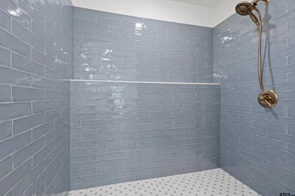 an entryway in a hall with a window