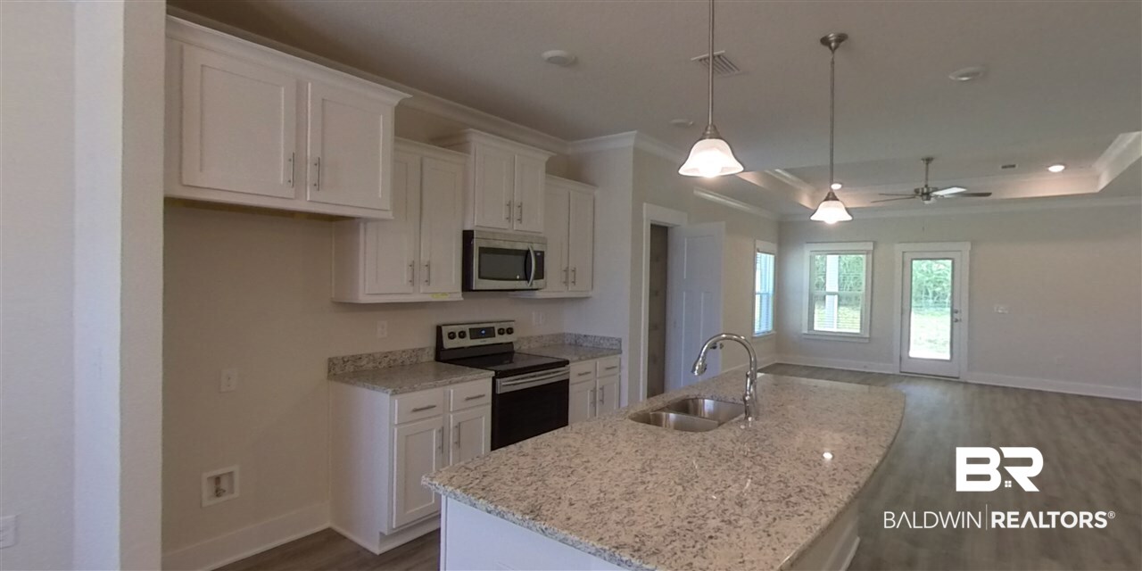 16440 Prado Loop Loxley, AL 36551 - Photo 2 of 11 Kitchen & Island