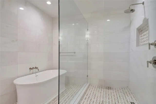 a bathroom with a sink and shower