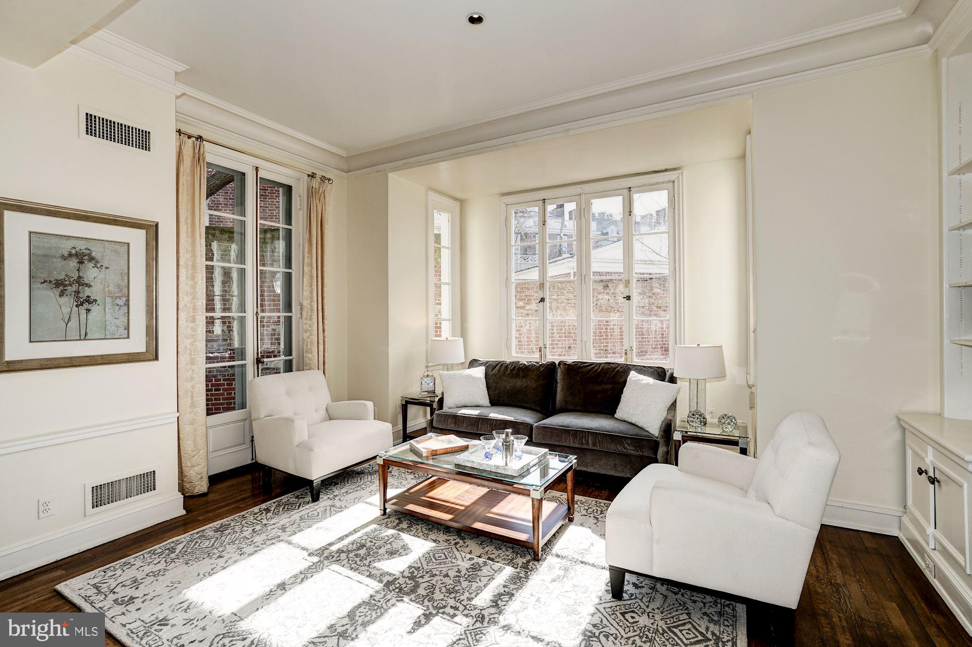 84 Kalorama Circle Northwest Washington, DC 20008 - Photo 11 of 45 a living room with furniture and a window