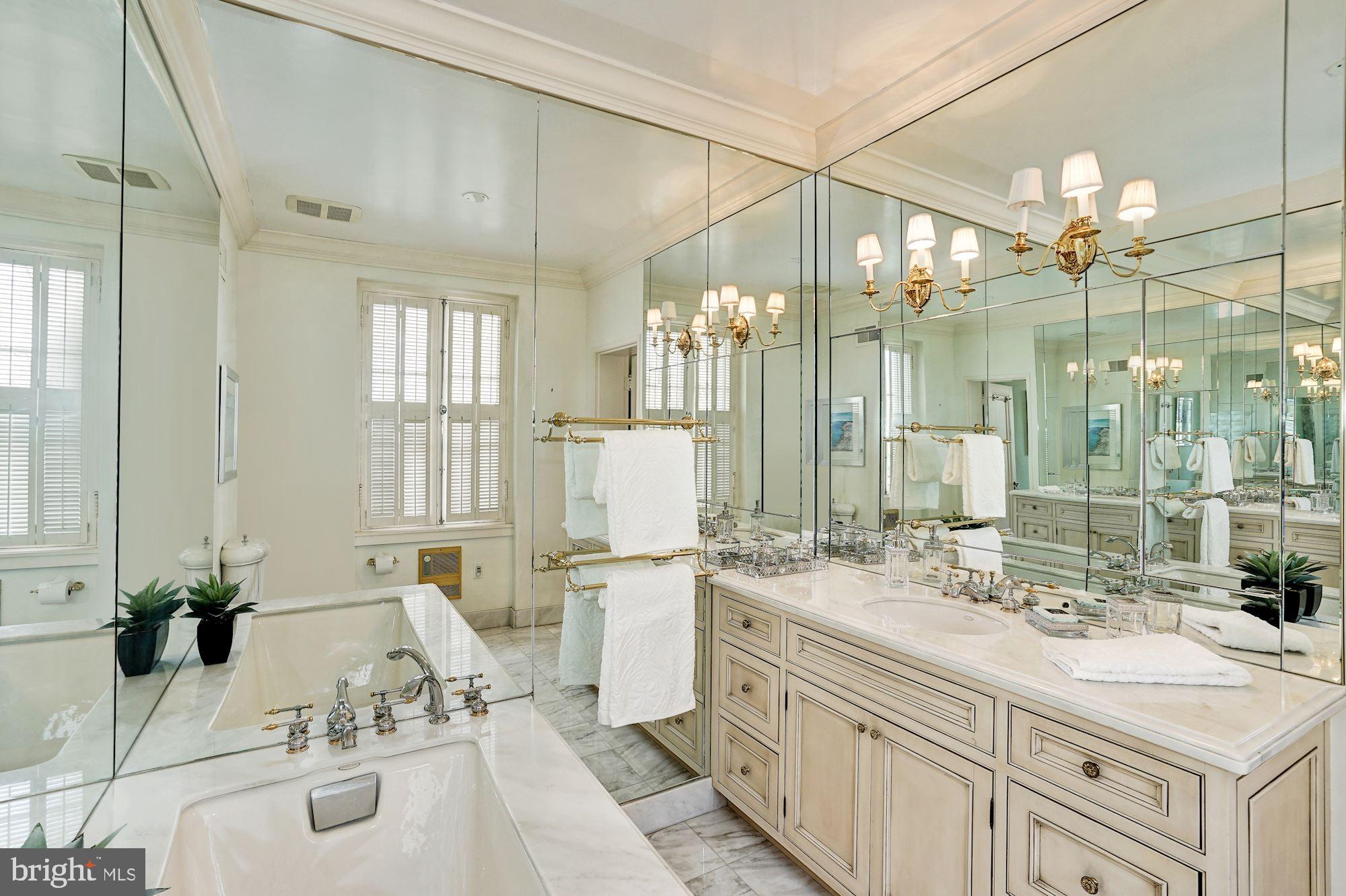 84 Kalorama Circle Northwest Washington, DC 20008 - Photo 29 of 45 a bathroom with a double vanity sink mirror and shower