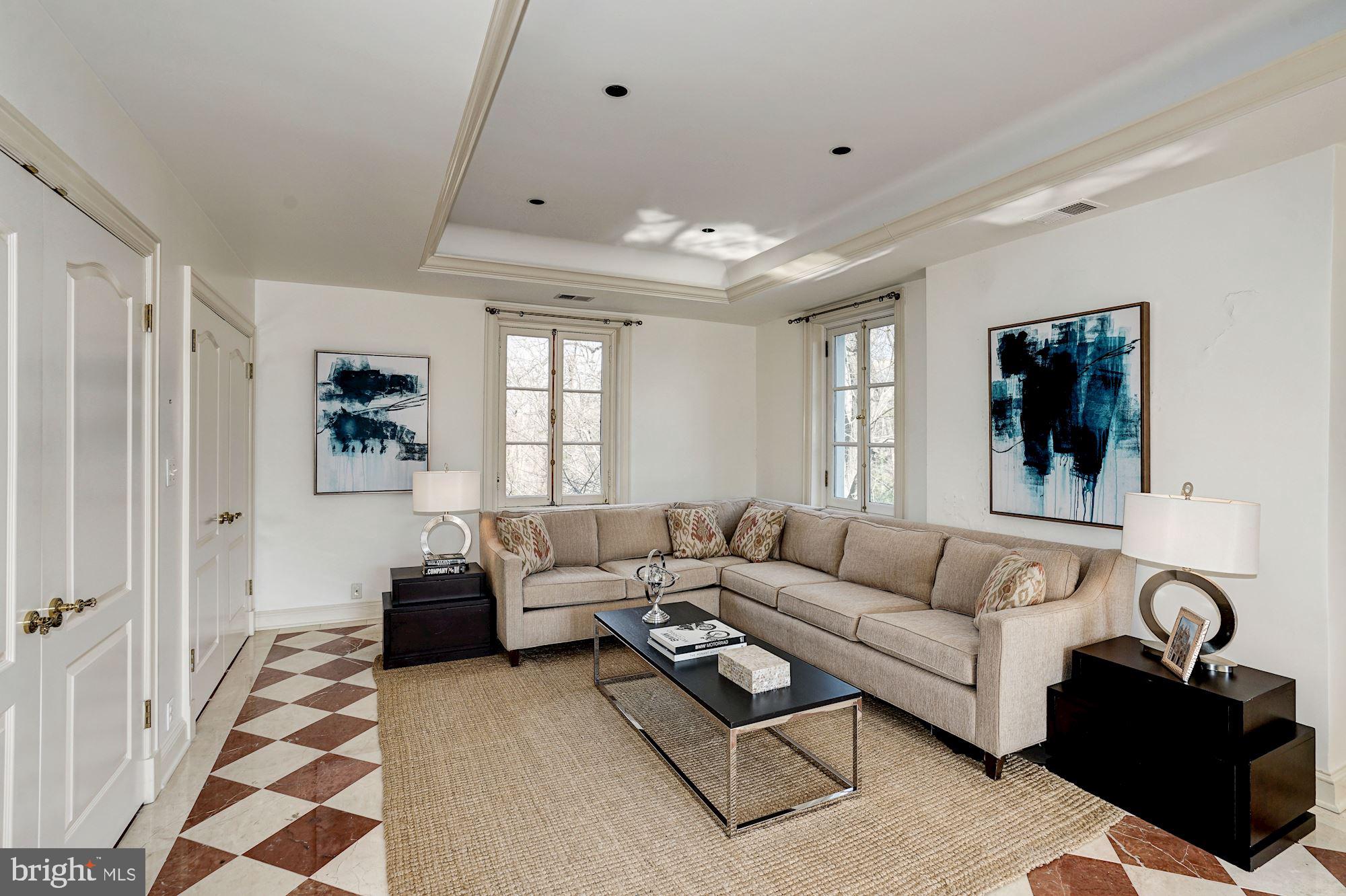 84 Kalorama Circle Northwest Washington, DC 20008 - Photo 31 of 45 a living room with furniture and a rug