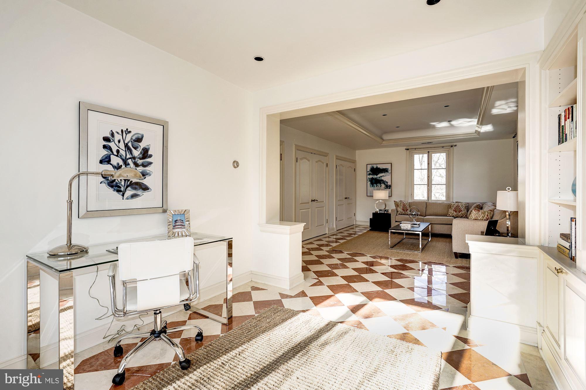 84 Kalorama Circle Northwest Washington, DC 20008 - Photo 34 of 45 a living room with furniture and a table