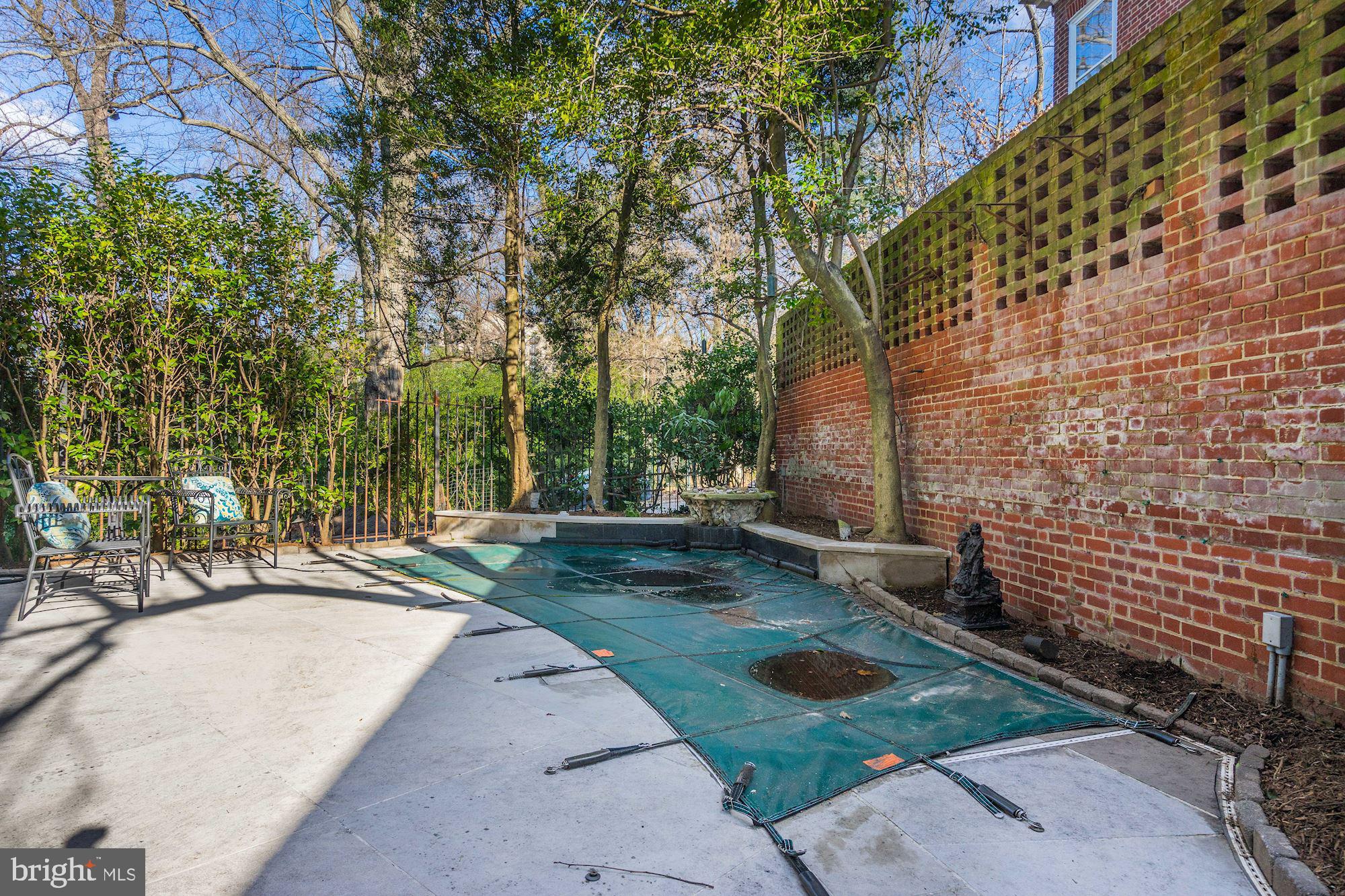 84 Kalorama Circle Northwest Washington, DC 20008 - Photo 44 of 45 a backyard of a house with barbeque oven