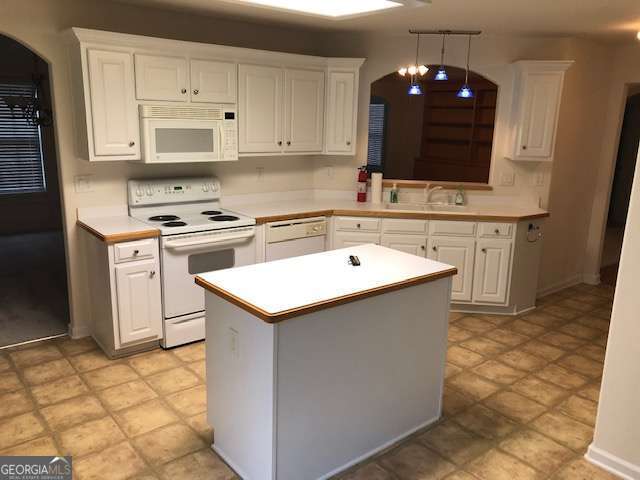 225 Lexington Circle Athens, GA 30605 - Photo 12 of 23 a kitchen with a sink and a stove top oven